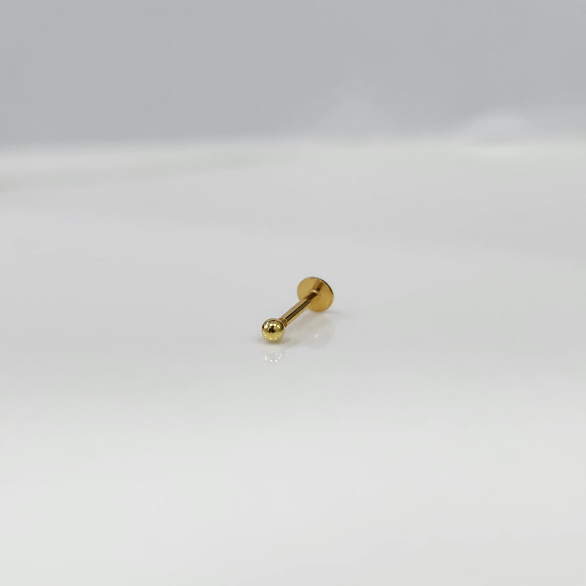 14K gold flat back stud with small round ball