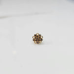Gold floral nose pin with brown stone detailing
