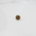 Gold flower ring with multicolor gemstones in double halo setting