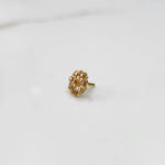 Gold flower ring with purple gemstones, front view