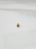 Gold four-leaf clover flower nose pin, top angle view showing pin