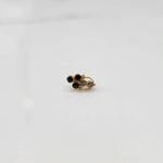 Gold ring with green and clear round gemstone cluster design
