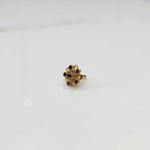 Gold nose pin with green and pink gemstone mandala design on white background
