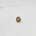 Gold round nose pin with green stones, product shot