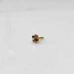 Gold floral nose pin with green and pink stones, product shot
