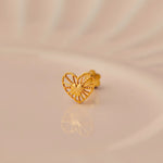 Gold heart-shaped stud earring with radial cutout design
