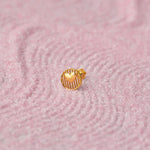 Gold heart medallion stud earring with ridged border