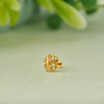 Gold domed stud earring with lattice flower design