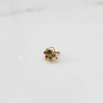 Handcrafted gold statement ring with mixed green and rose stone setting