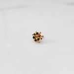 Gold statement ring with multicolor gemstones in scattered dotted cluster design