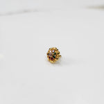 Gold floral ring with navratna multicolor stone setting