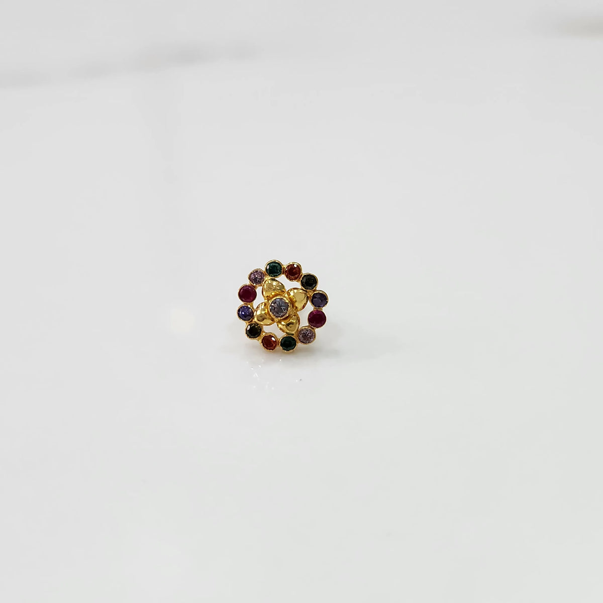 Gold round nose pin with navratna multicolor stones, product shot