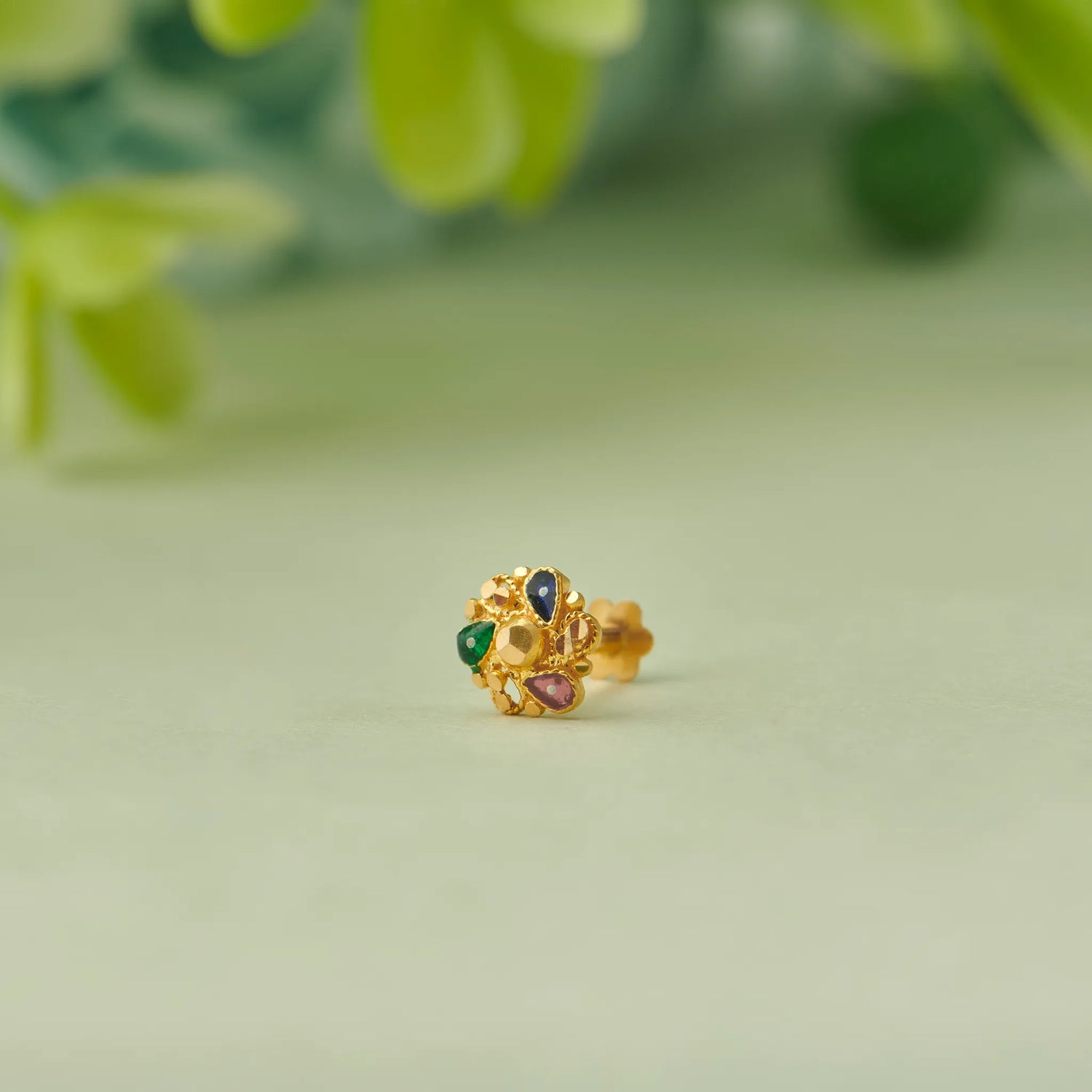 Gold cluster stud earring with multicolor gemstone accents