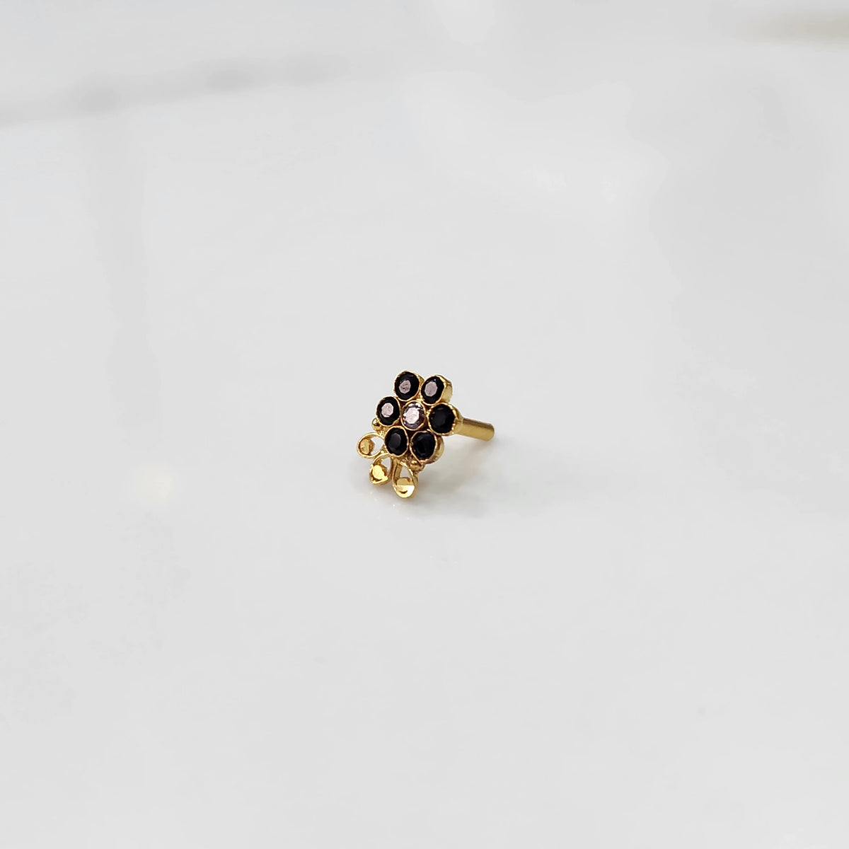 Lab grown diamond nose pin with dark stone floral design