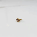 Gold nose pin with small all-champagne stone cluster