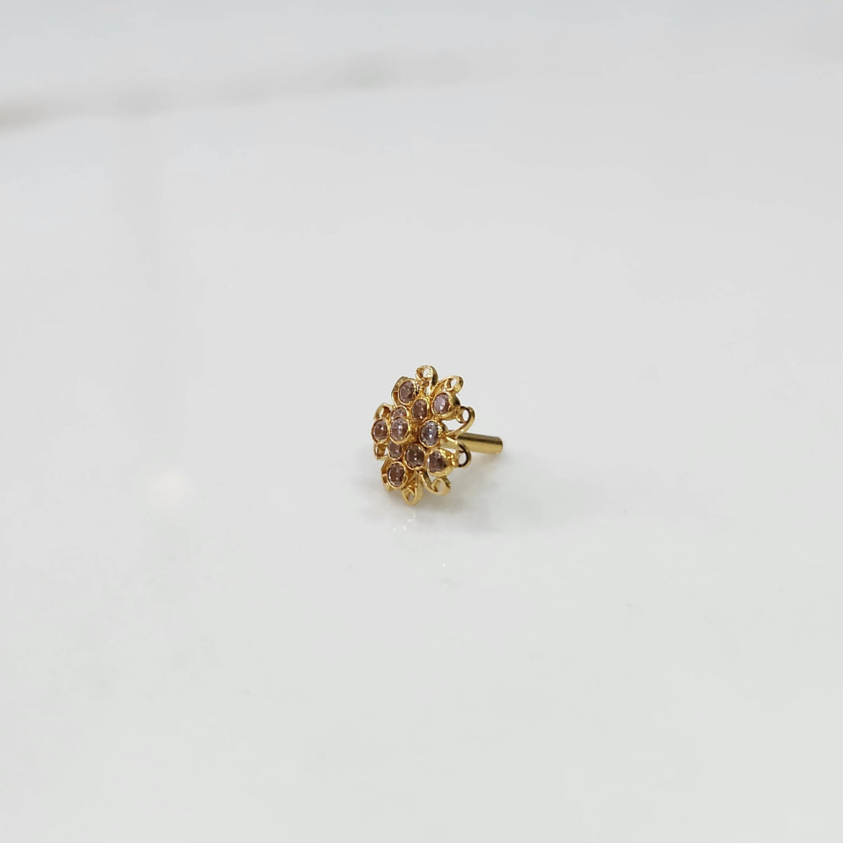 Nose pin new design gold with intricate floral diamond detailing