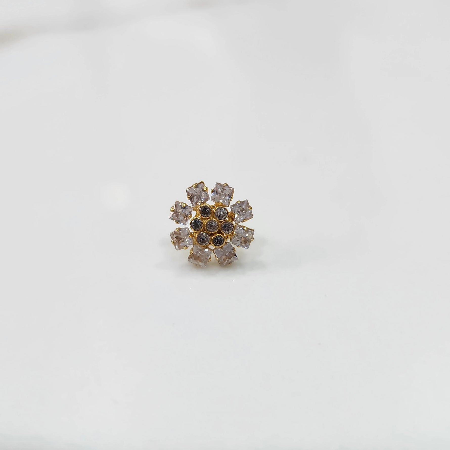 Gold nose pin design with white floral diamond cluster