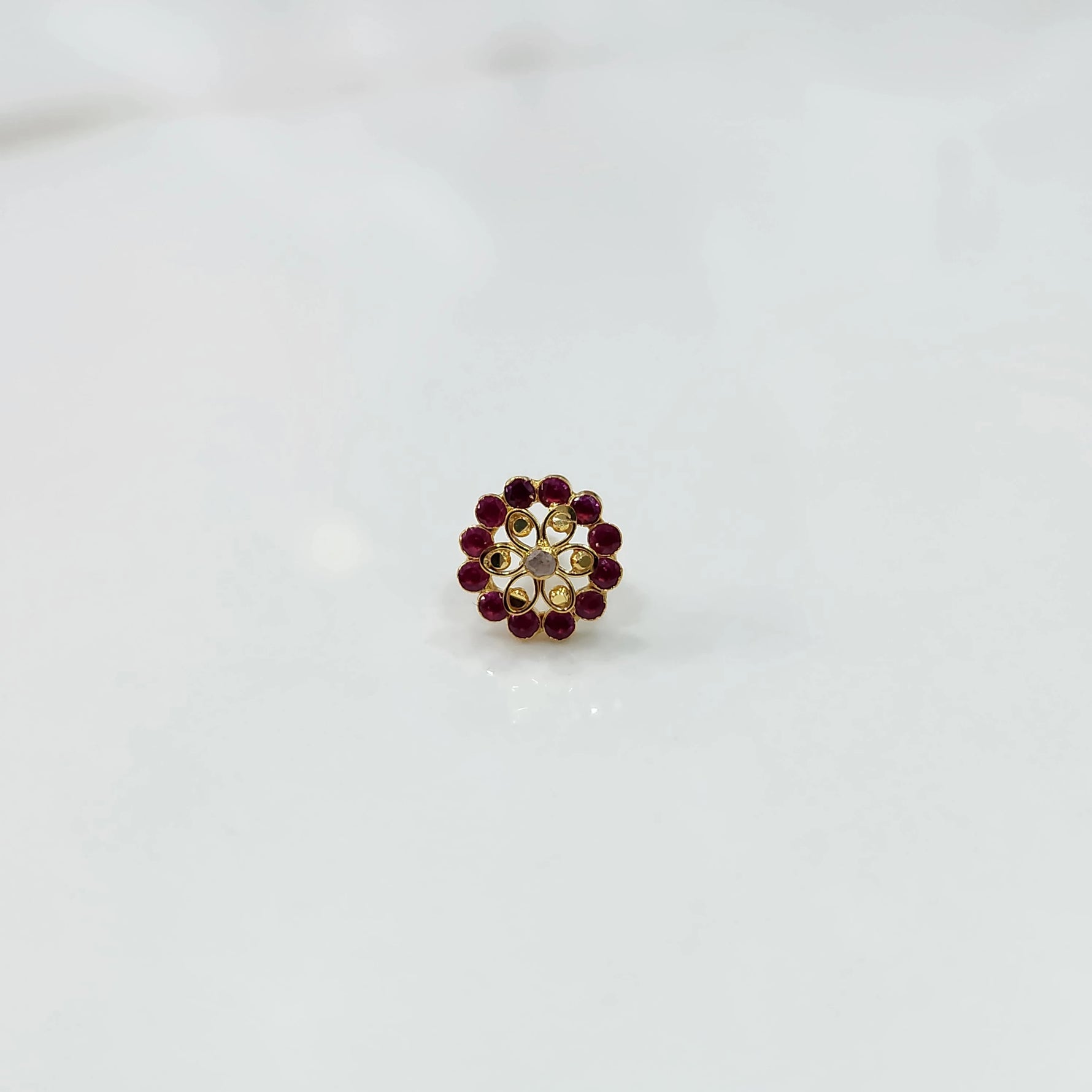 Gold nose pin with double-layer ruby and champagne stone floral petals
