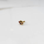 Women's gold nose pin design minimal floral gemstone cluster on white background
