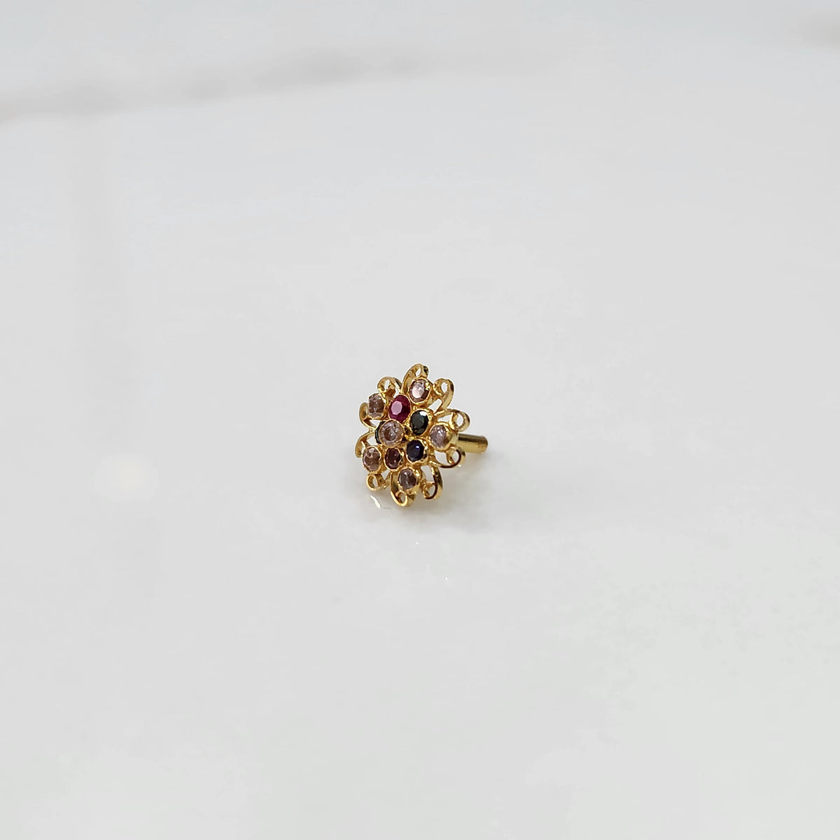 Nose pin new design gold with multicolor floral pattern on white background