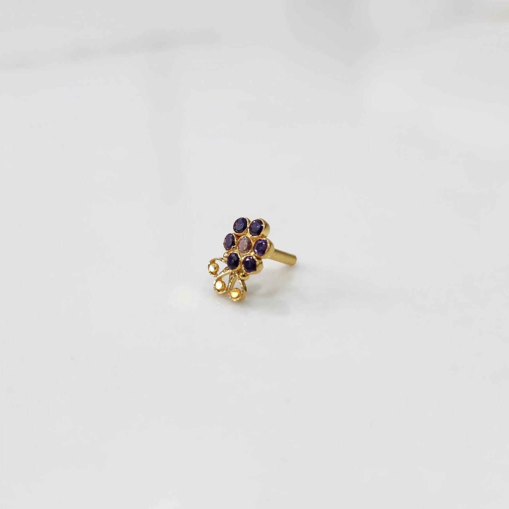 Lab grown diamond nose pin with compact floral gemstone arrangement
