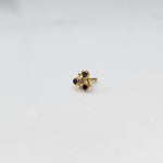Gold nose pin with purple stone cluster in organic branch-style setting