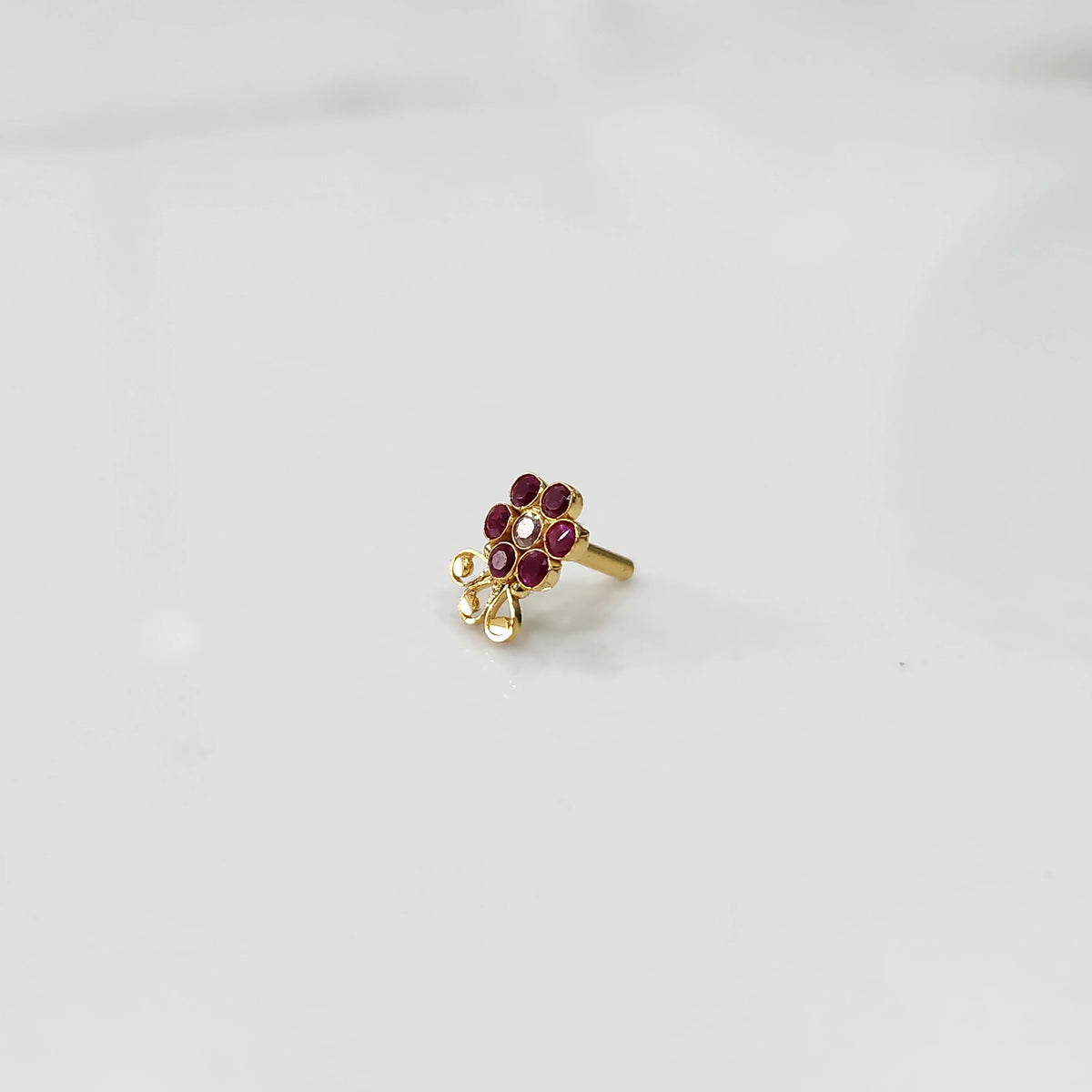 Side angle lab grown diamond nose pin with floral gemstone cluster
