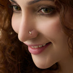 Stone Gold Nose Pin worn by a woman showcasing a subtle, elegant everyday look