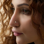 Gold Nose Pin worn by a woman highlighting a delicate and elegant everyday style