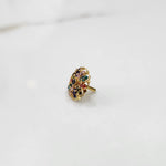 Gold oval ring with multicolor gemstones, front view