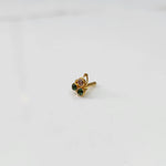 Gold nose pin with pink and green stones, product shot