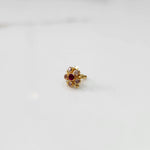 Gold floral nose pin with pink and red stones, product shot