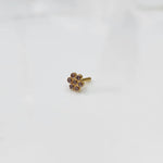 Front view nose pin design gold with small floral cluster design