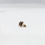 Gold ring with clear and blue flower cluster and dangling drop stone