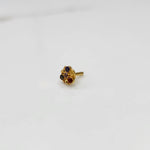 Gold ring with multicolor gemstone round floral design, side view