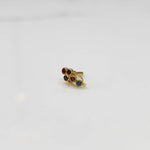 Gold ring with multicolor round gemstone cluster design
