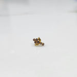 Gold ring with smoky quartz leaf-charm cluster design, side view
