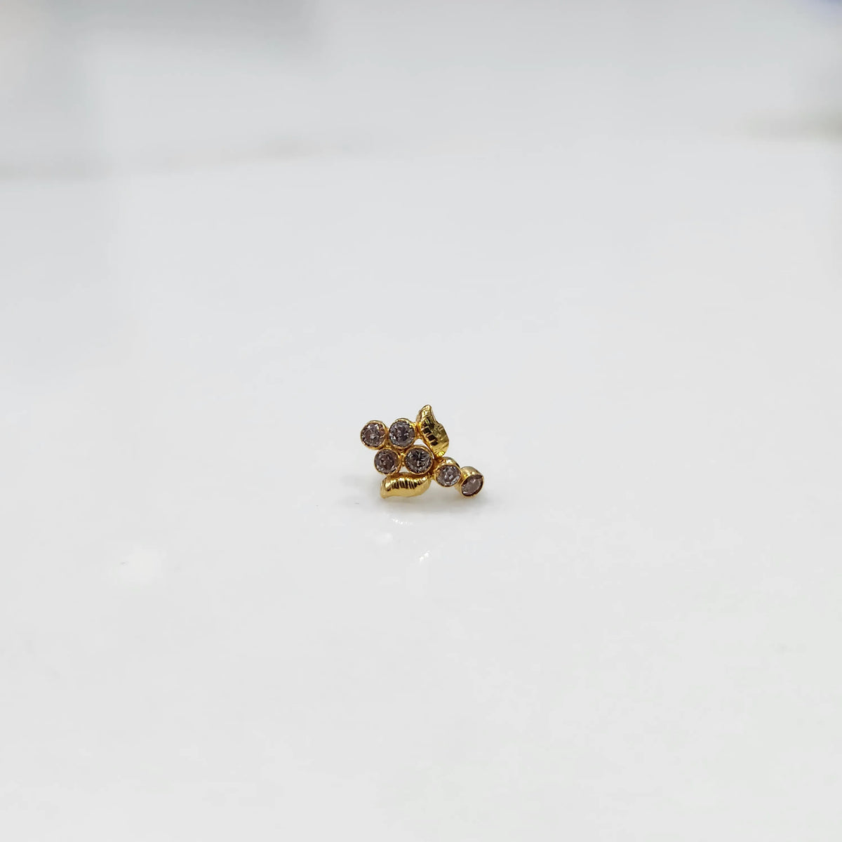 Gold ring with smoky quartz leaf-charm cluster design, side view