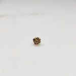Gold ring with smoky quartz round floral design, front view