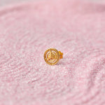 Gold round stud earring with trefoil cutout design