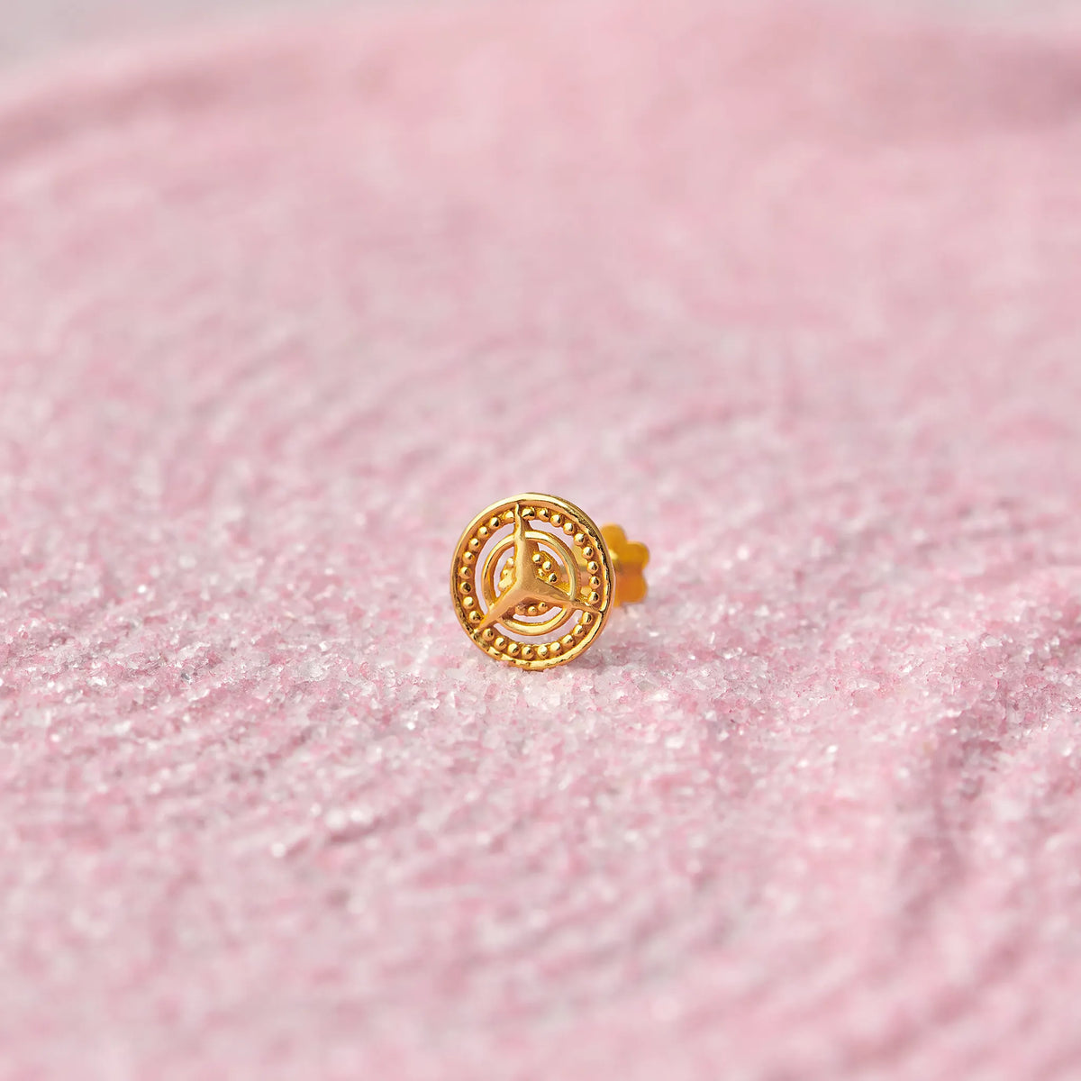 Gold round stud earring with trefoil cutout design