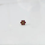 Nose pin design gold with tone floral pattern on white background