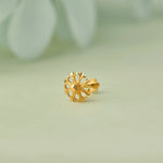 Gold stud earring with star-burst open-work design  