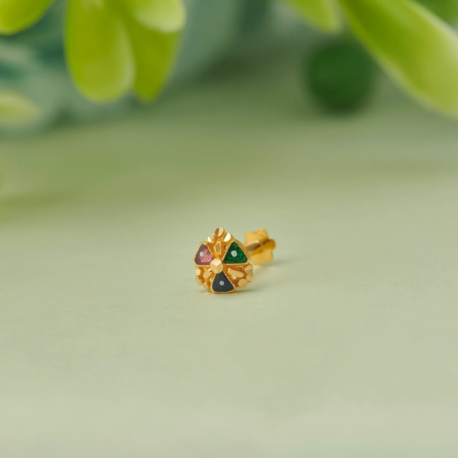 Gold stud earring with triangular multicolor gemstone accents