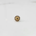 Gold round nose pin with white stone halo, product shot