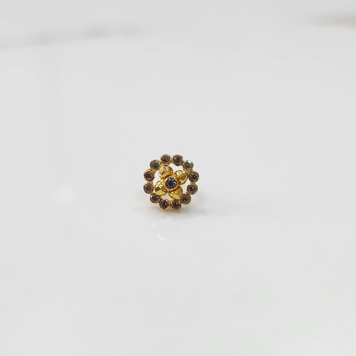 Gold round nose pin with white stone halo, product shot