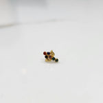 Gold ring with multicolor gemstone leaf-charm cluster design, side view