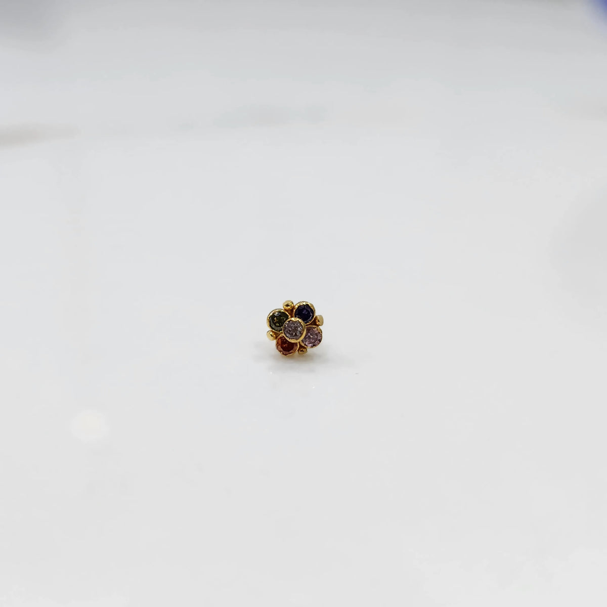 Front view of gold ring featuring multicolor gemstone cluster in round floral pattern