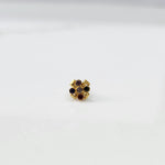 Antique-style gold ring with multicolor-toned stones in scalloped petal pattern