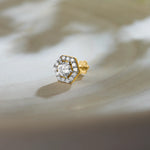 Hexagon halo lab grown gold nose pin with center diamond on soft background